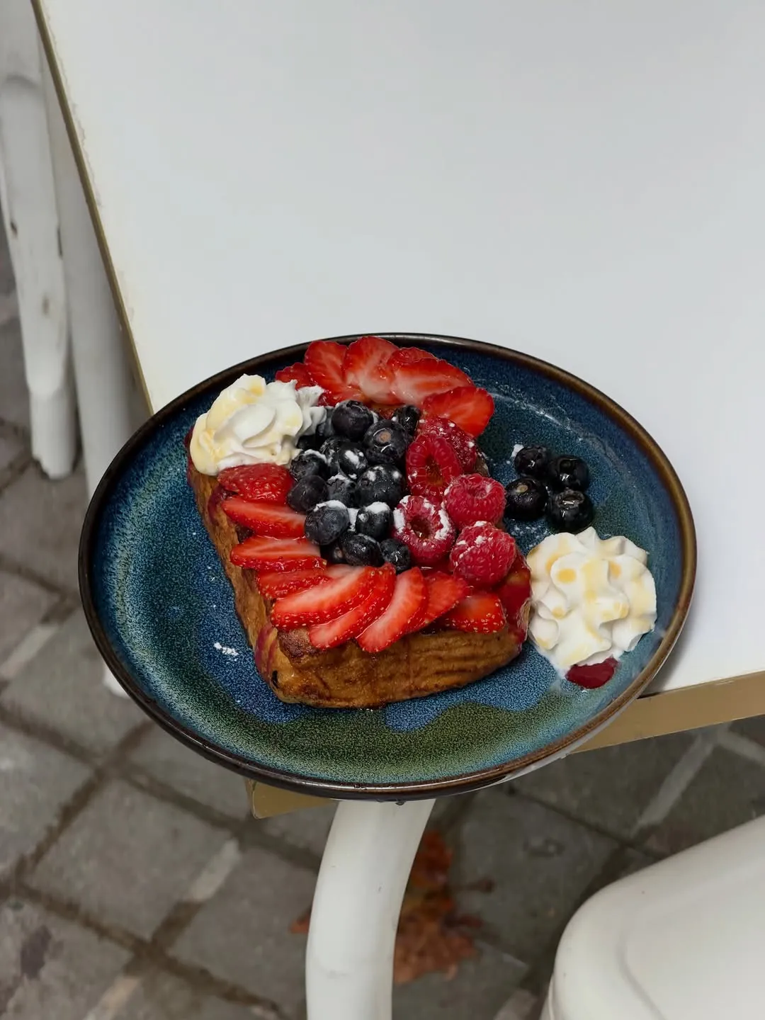 French toast topped with red berries